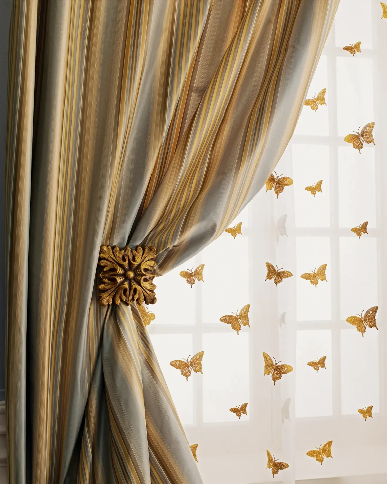 Floor-length silk drapes cleaned and rehung in a San Francisco home by Alex's Dry Cleaning Valet